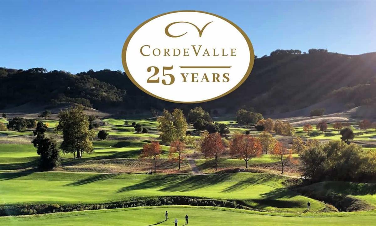 view of the golf course and 25 years logo