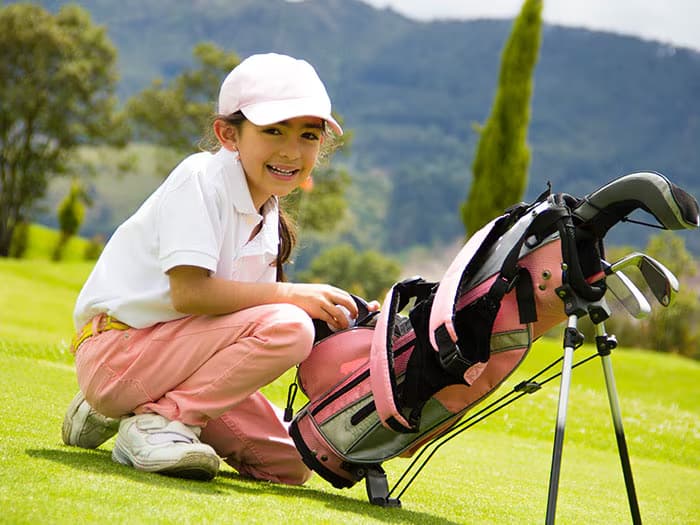 kid playing golf